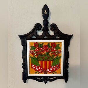 1970s Holt Howard Trivet colorful folk art tile set in cast iron frame. Japan